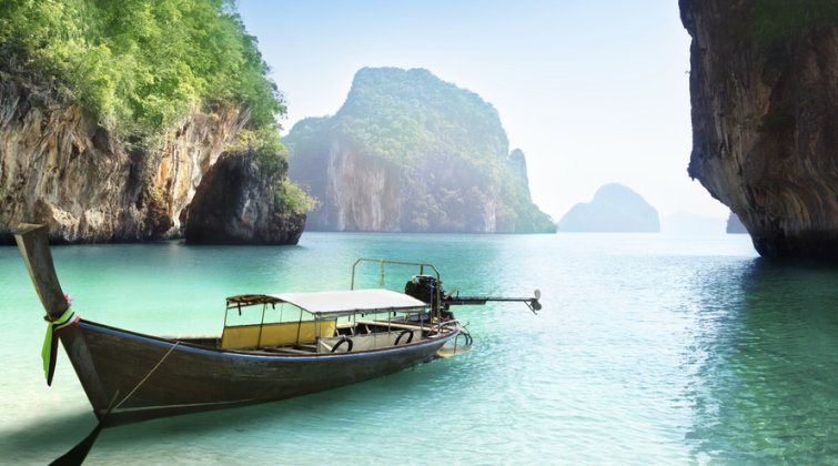 Long-tail boats are a popular form of transportation between islands in Thailand